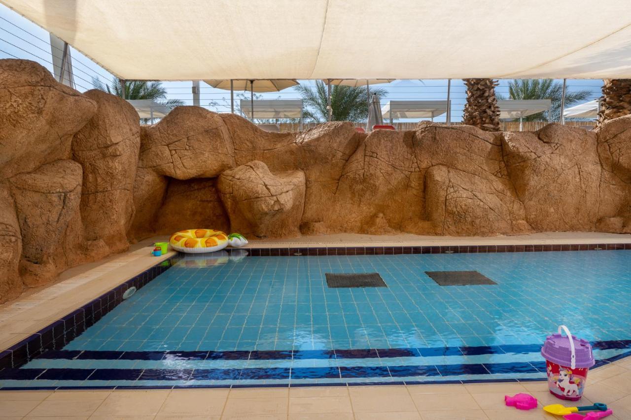 Vert Hotel Eilat By Afi Hotels Bagian luar foto The swimming pool at the Dead Sea Spa Magdala